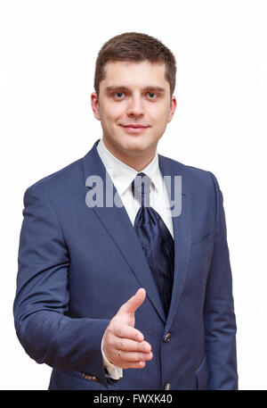 businessman extending hand to shake Stock Photo
