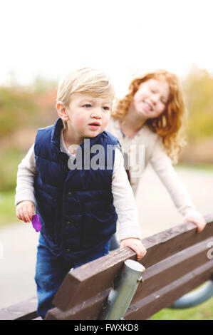 Family pictures of brother and sister at the park Stock Photo - Alamy