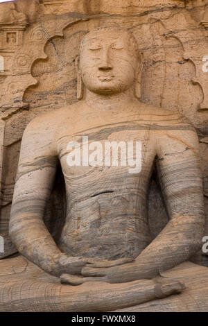 Sri Lanka, Polonnaruwa, Gal Vihara, Dhyana Mudra, seated Buddha statue in meditating posture carved into rock face Stock Photo