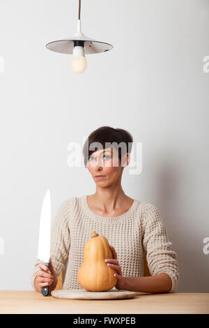 woman with a pumpkin Stock Photo