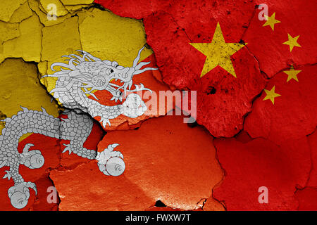 flag of Bhutan painted on cracked wall Stock Photo - Alamy