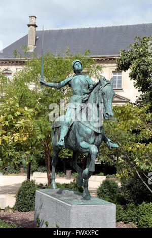 An equestrian statue of Joan of Arc on Place Cardinal-Luçon, close to Cathedrale Notre Dame in Reims, Champagne-Ardenne, France. Stock Photo