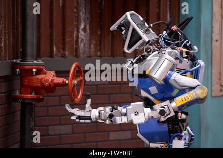 Team HRP2 Tokyo robot during the DARPA Rescue Robot Showdown at  Fairplex Fairground June 6, 2015 in Pomona, California. The DARPA event is to challenge teams to design robots that will conduct humanitarian, disaster relief and related operations. Stock Photo