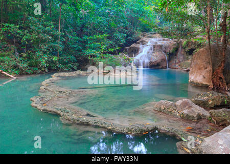 Waterfalls In Deep Forest at Erawan Waterfall in National Park Kanchanaburi Thailand Stock Photo