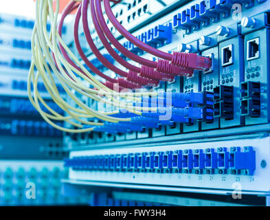 Fiber optic connecting on core network swtich Stock Photo