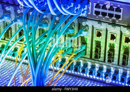 Fiber optic connecting on core network swtich Stock Photo