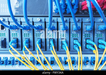 Fiber optic connecting on core network swtich Stock Photo