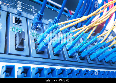Fiber optic connecting on core network swtich Stock Photo