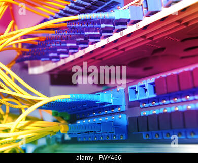 Fiber optic connecting on core network swtich Stock Photo