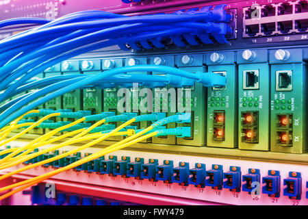 Fiber optic connecting on core network swtich Stock Photo