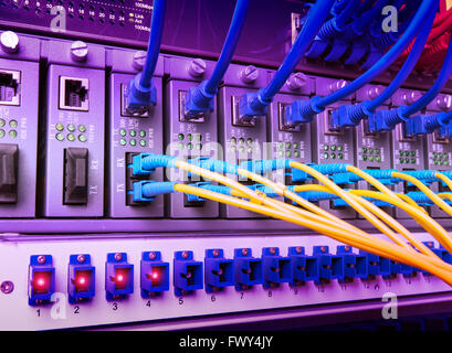 Fiber optic connecting on core network swtich Stock Photo
