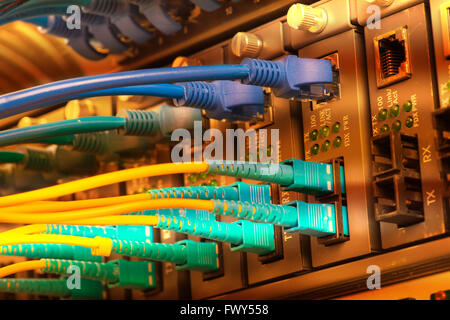 Fiber optic connecting on core network swtich Stock Photo