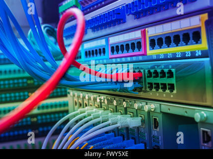 Network switch and ethernet cables Stock Photo