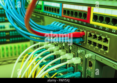 Fiber optic connecting on core network swtich Stock Photo