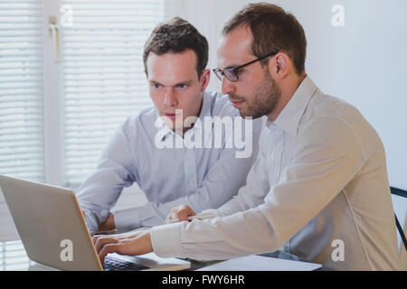 financial analysis and project management, business  people working with computer in modern office interior Stock Photo