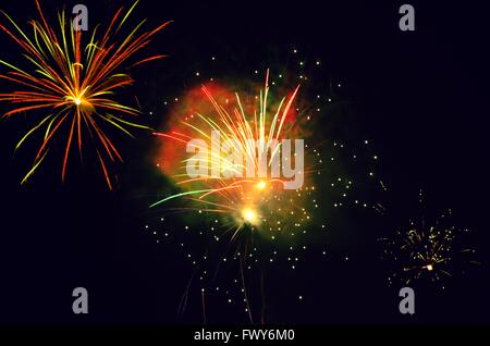 Colorful firework on black background, new year event Stock Photo