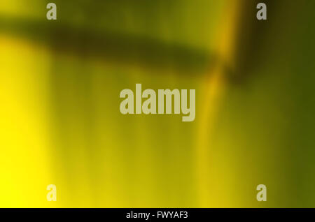 Vertical yellow blur  background with brown shadow on the top Stock Photo