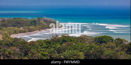 OSA PENINSULA, COSTA RICA - Waves and surf of Pacific Ocean, at Sombrero Beach, in Golfo Dulce. Stock Photo