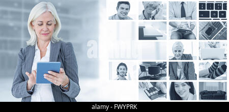 Composite image of confident businesswoman using digital tablet Stock Photo