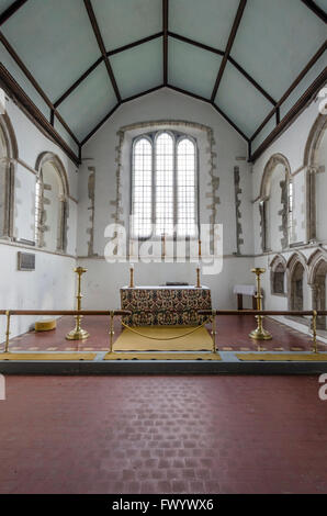 View of the chancel and altar of Saint Augustines church, Brookalnd, Romney Marsh, Kent Stock Photo