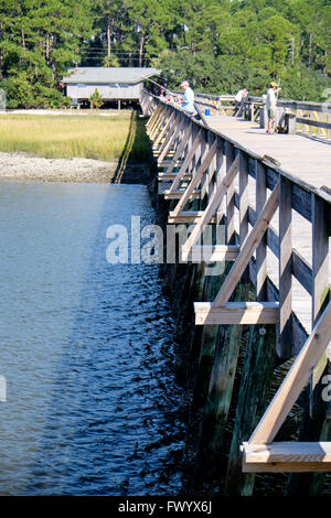 Fishing pier at Fripp inlet on Hunting Island State Park, South ...