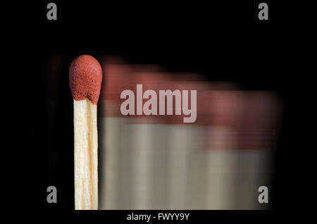 Match isolated on black background in motion. Stock Photo