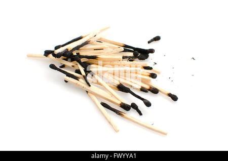 Pile of used matches isolated on white background. Stock Photo
