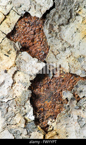 Detail of rusty cracky qray yellow metal surface. Stock Photo