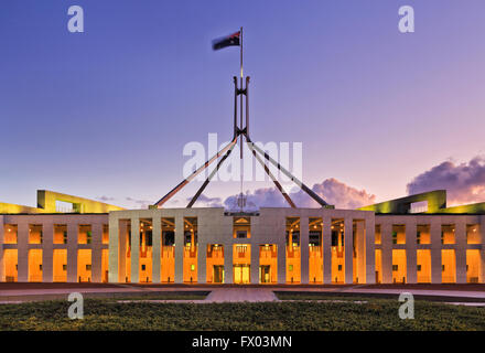 Close-up facade, columns and entrance to Canberra's Parliament house at sunset. State symbol and senate of Australia has free Stock Photo