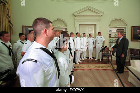 Washington, District of Columbia, USA. 18th May, 2001. United States President George W. Bush greets the crew of the Navy surveillance plane that was held 11 days on China's Hainan island in April during a meeting in the Oval Office of the White House in Washington, DC on May 18, 2001.Credit: Robert Trippett/Pool via CNP © Robert Trippett/CNP/ZUMA Wire/Alamy Live News Stock Photo