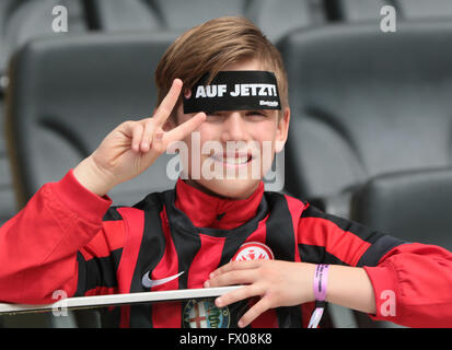 A fan in the stands wears an old Josh Brown jersey with Brown's