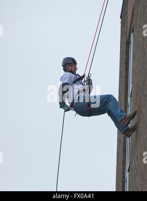 Kenilworth, Warwickshire, UK. 09th Apr, 2016. Attorney General Jeremy Wright QC MP abseiled down from the top of the Holiday Inn which is directly opposite his constituency office in the Warwickshire town of Kenilworth. As local MP he said he was overcoming his fear of heights to help raise money for the Teenage Cancer Trust, he hopes to raise £1000 from sponsorship from the event which other local people also took part in on Saturday afternoon 9 April 2016. Credit:  Fraser Pithie/Alamy Live News Stock Photo
