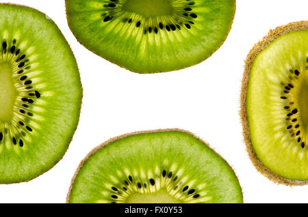 Four halfs of kiwi's sheets isolated on white background. Stock Photo