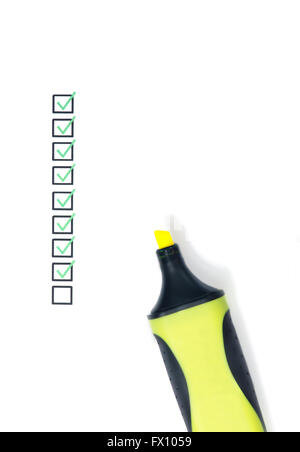 Several boxes, green ticks and the yellow marker. Stock Photo