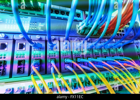 Fiber optic connecting on core network swtich Stock Photo