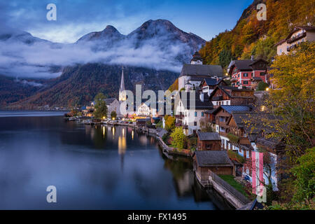 Hallstatt mountain village in fall during twilight, Salzkammergut, Austria Stock Photo