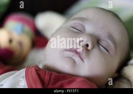 Calm sleeping baby at midday Stock Photo