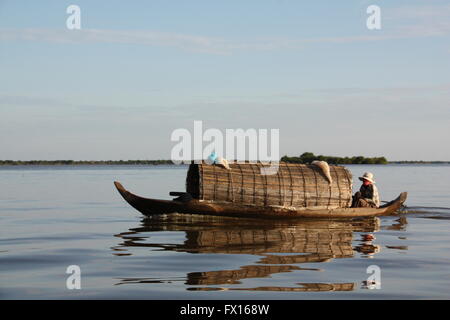 A boat crossing the Tonle Sap lake, Cambodia Stock Photo