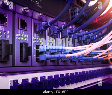 Fiber optic connecting on core network swtich Stock Photo