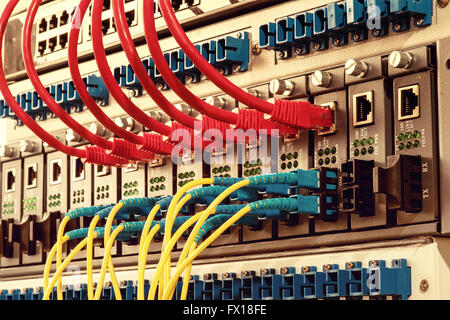 Fiber optic connecting on core network swtich Stock Photo
