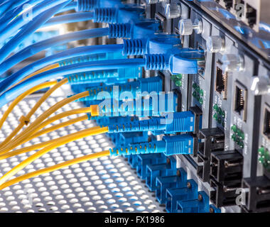 Fiber optic connecting on core network swtich Stock Photo