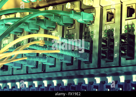 Fiber optic connecting on core network swtich Stock Photo