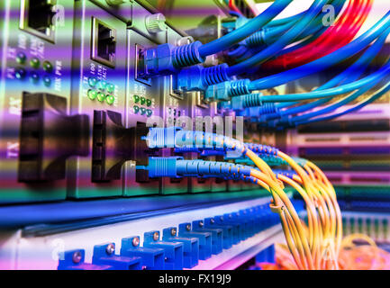 Fiber optic connecting on core network swtich Stock Photo