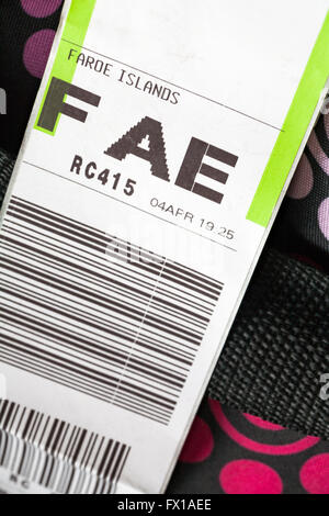 Atlantic Airways luggage label stuck on case for FAE Faroe Islands Vagar airport Stock Photo