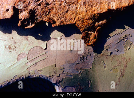 Colorful abstract close-up of rusting paint on automobile Stock Photo