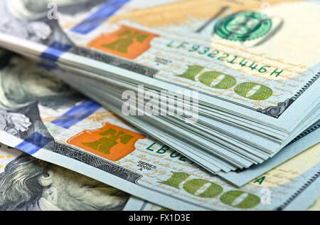 Stack of one hundred dollar bills close-up
