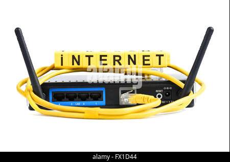 Network yellow cable and router or modem Stock Photo