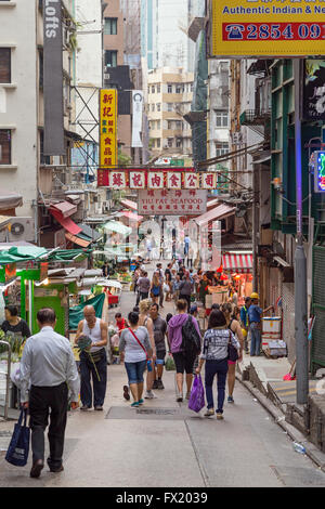 A lot of people at a pedestrian street at the Mid-Levels in Central, Hong Kong, China. Stock Photo