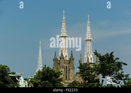 The white metal tower at the Catholic Cathedral neo-gothic Roman  where the seat of the Roman Catholic Archbishop of Jakarta, In Stock Photo