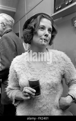 Woman smoking cigar Britain 1960s 1967 Stock Photo